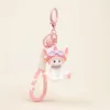 Cute white cat keychain with pink aviator helmet, goggles, bell, and paw print strap