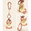 Devon Cat keychain figurine with aviator hat, pink paw pads, and brown carabiner clip