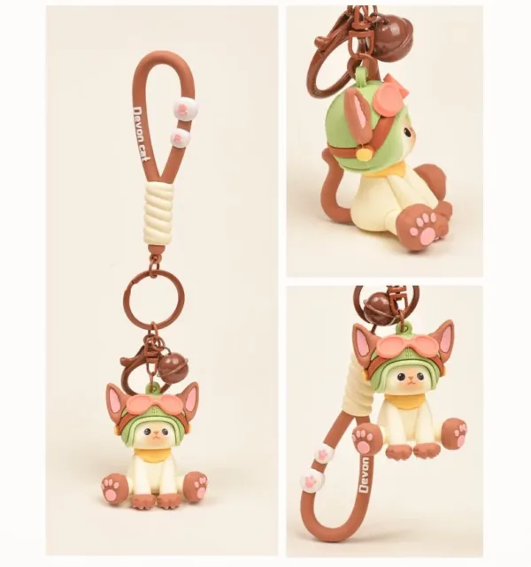 Devon Cat keychain figurine with aviator hat, pink paw pads, and brown carabiner clip