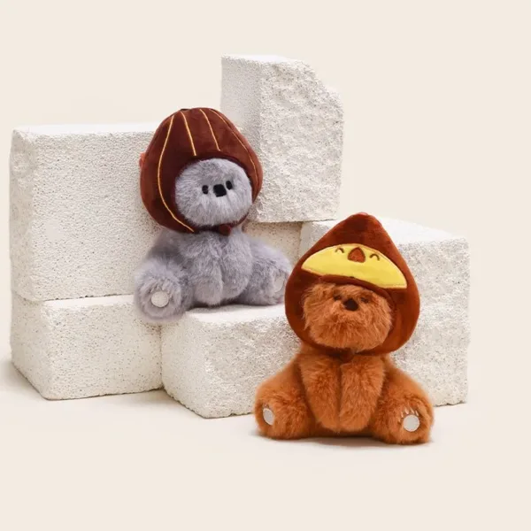 Both Grey And Orange Koala wearing hat keychain