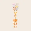 Cute orange fox character keychain with lobster clasp on retail packaging card