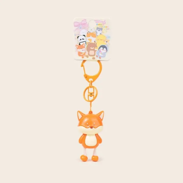 Cute orange fox character keychain with lobster clasp on retail packaging card