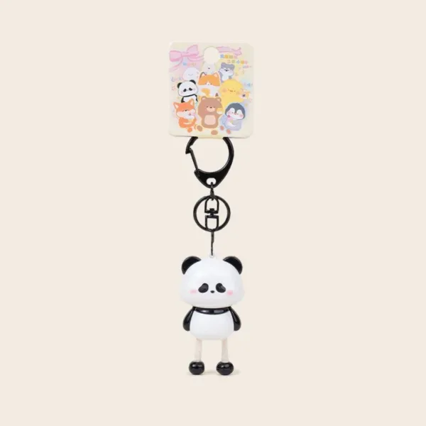 Cute panda character keychain with pink cheeks and black carabiner clip on retail card