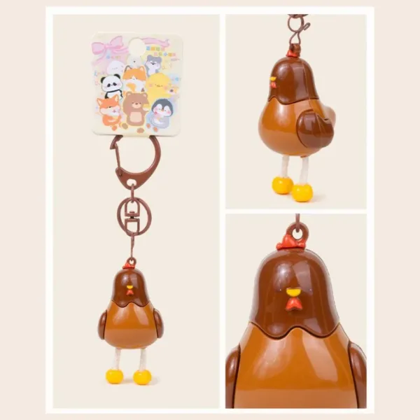 Brown chicken keychain charm with yellow feet and red comb on cute animal backing card