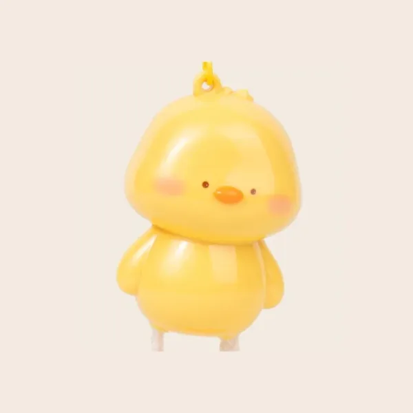 Cute yellow chick figurine keychain with rosy cheeks and orange beak