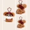 Fluffy brown teddy bear keychain with glasses, red Huhu cap, checkered bandana, and star clip