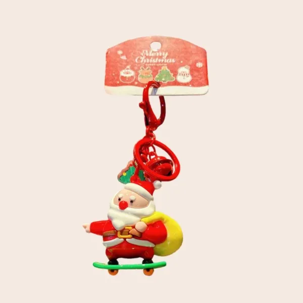 Santa Claus on skateboard keychain with Merry Christmas holiday packaging