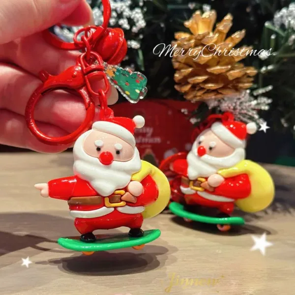 Santa Claus Skateboard Keychain Christmas Holiday Gift Charm Santa Claus keychain figurine on skateboard with MerryChristmas text and holiday decor