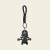 Black Toothless dragon keychain with green eyes and DragonX braided strap