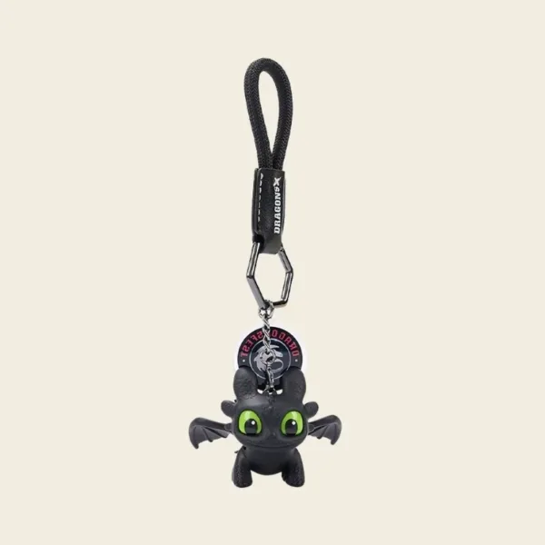 Black Toothless dragon keychain with green eyes and DragonX braided strap
