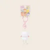 Cute white bunny keychain with pink ears and lobster clasp on colorful animal character backing card
