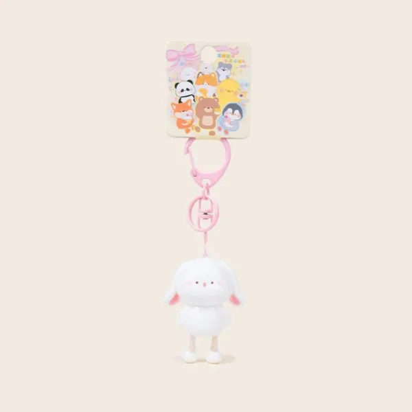 Cute white bunny keychain with pink ears and lobster clasp on colorful animal character backing card