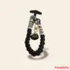 Black braided phone lanyard strap with cat charm and JEON GA TUD text labels