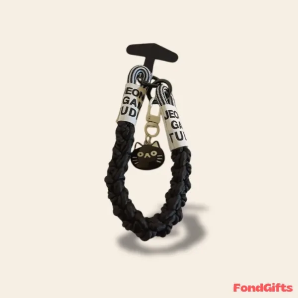 Black braided phone lanyard strap with cat charm and JEON GA TUD text labels