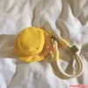 Yellow Corduroy Pet Bucket Hat with Leash Set for Dogs Yellow corduroy bucket hat with matching leash and white rope strap featuring smiley face clip on cream fabric background