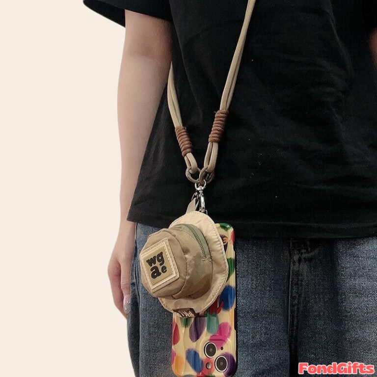 Crossbody phone case with colorful pattern, mini wgae pouch, and beige lanyard strap