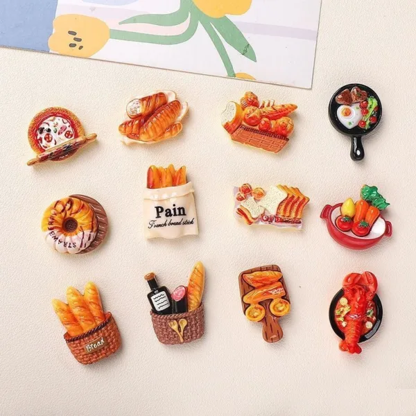 Food-themed refrigerator magnets featuring bread, pastries, pizza, and cooking pans
