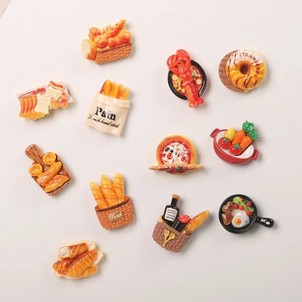 Colorful food-themed refrigerator magnets featuring bread baskets, lobster, donuts, pizza, and vegetables