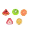 Five colorful resin fruit slice charms featuring watermelon, kiwi, orange, strawberry, and lemon